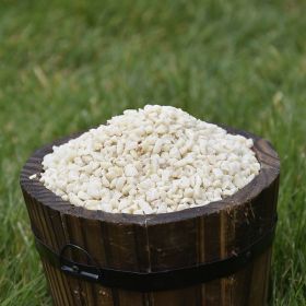 Small wooden bucket filled with Peanut Granules for Birds