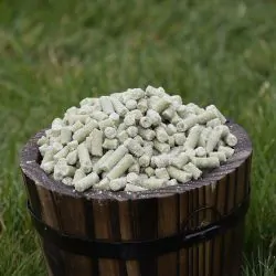Small wooden bucket filled with green Suet Pellets apple flavour