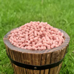 small bucket filled with Ivel Valley Wild Bird Food mini suet berry pellets 